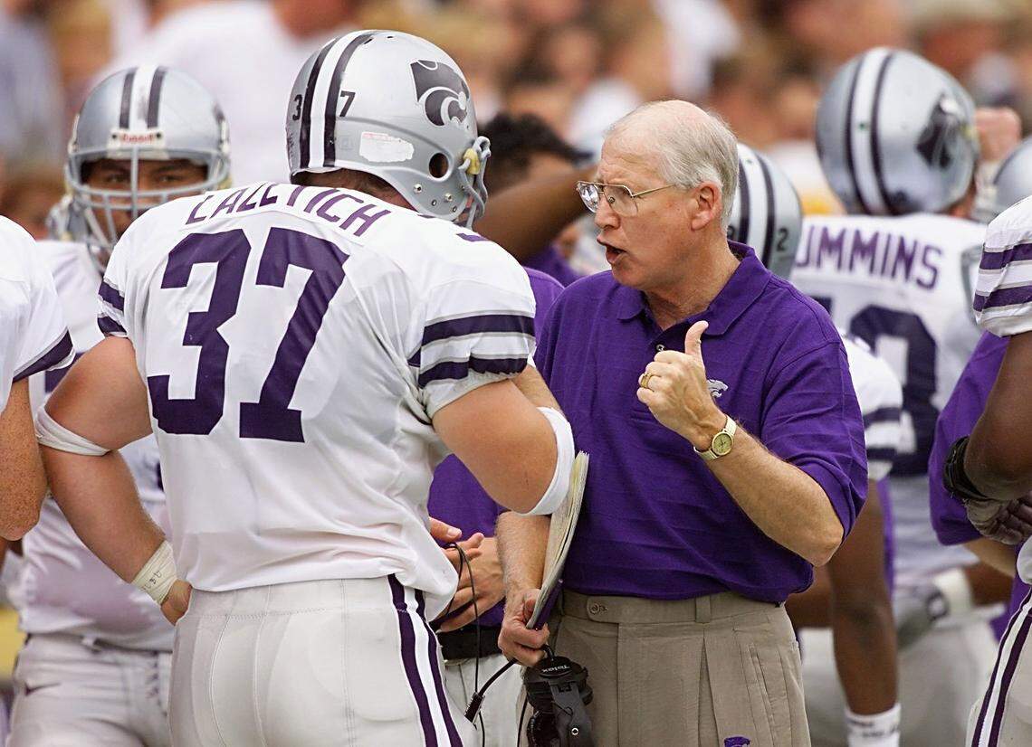 30 Sep 2000: Head coach Bill Snyder chats with fullback Johnno Lazetich #37 of Kansas State against Colorado in the first quarter at Folsom Field in Boulder, Colorado. Kansas State won 44-21. <DIGITAL IMAGE> Mandatory Credit: Brian Bahr/ALLSPORT