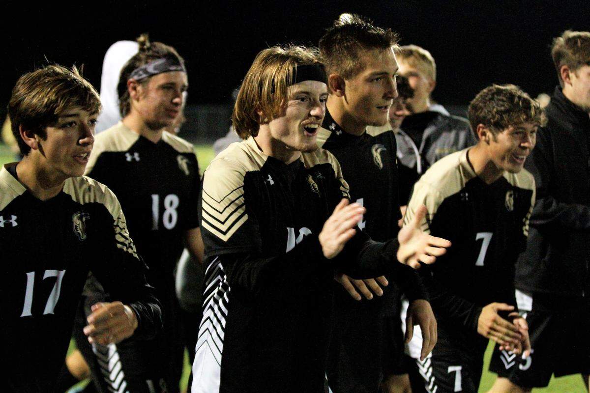 Maize South senior Andrew Bliss and his teammates celebrated his double-overtime, game-winning goal in the Mavericks’ 2-1 regional championship victory over Eisenhower on Thursday night. (Oct. 25, 2018)