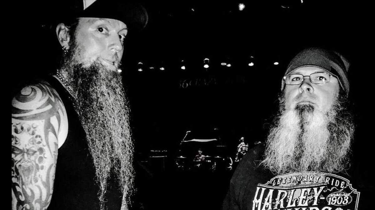 Kevin Kinkelaar, left, is the guitarist for metal band KingShifter. Derek Ludewick, right, is the bass player. The two are partnering up to open JJ Beard’s Pub & Pizza at 13th and West.