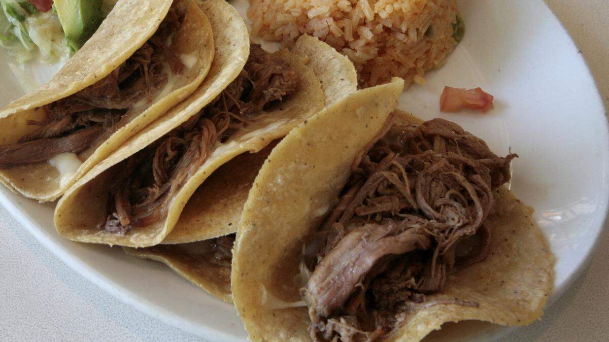 Two Texas detention officers were sentenced after smuggling “meth” and brisket tacos into the Bexar County jail, authorities said.