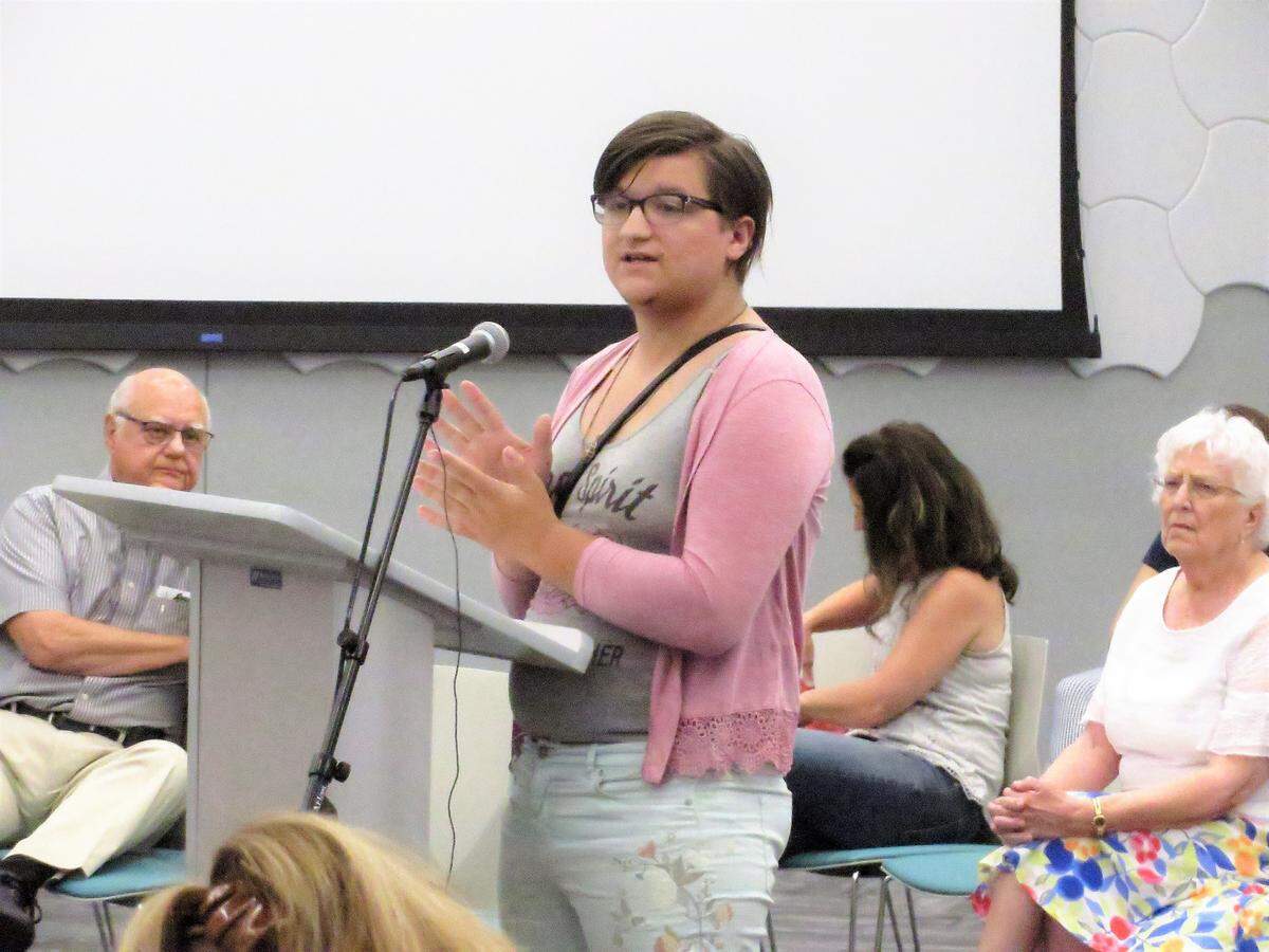 Rexy Que, vice president of the Wichita Transgender and Community Network, addresses the library board about a proposed policy on background checks inspired by a drag queen story time at the library.