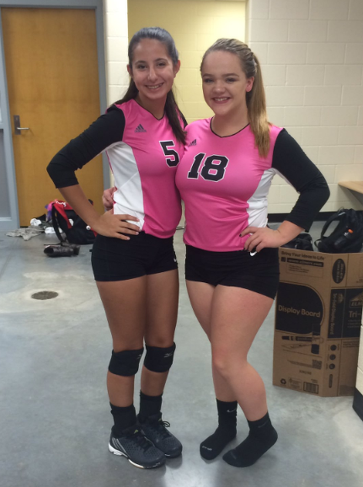 Heights’ Ashley Vega (left)
