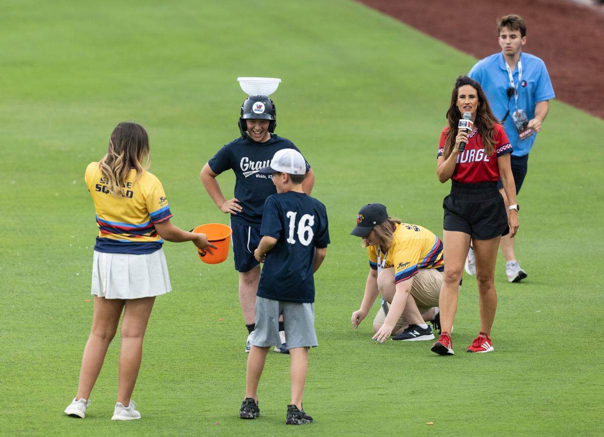 Fans take part in a game between innings during a recent Wichita Wind Surge game.