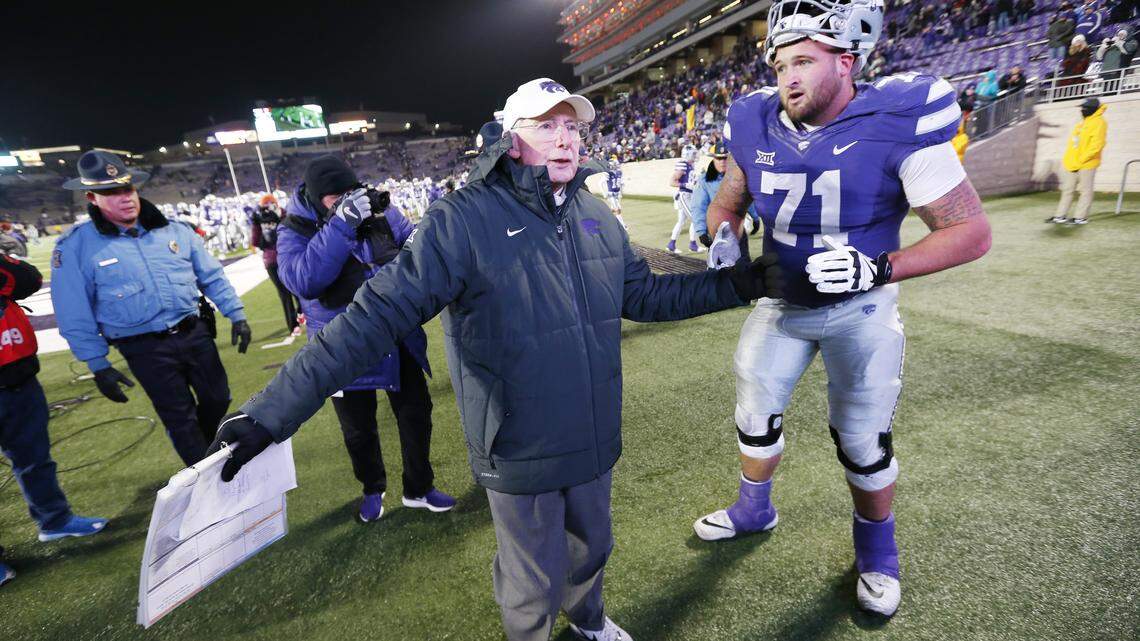 K-State head coach Bill Snyder and K-State offensive lineman Dalton Risner (71) after the win over Texas Tech. (November 17, 2018)