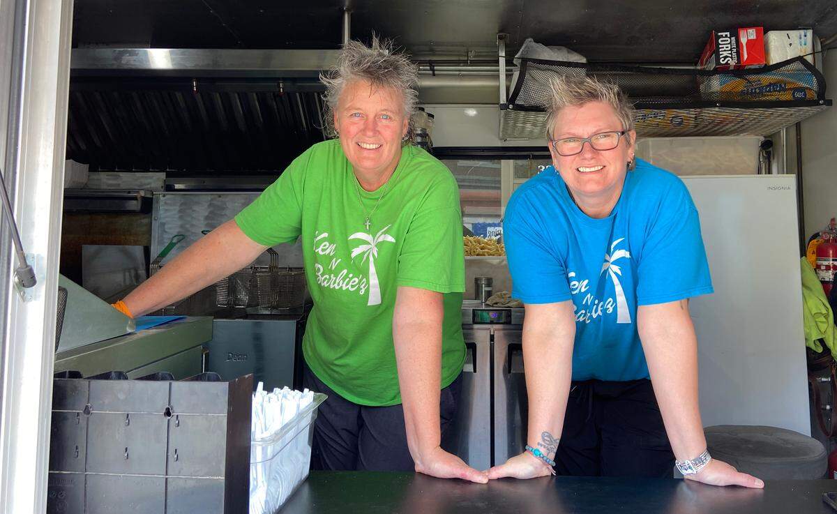 Kelly Ake, right, co-owns Ken N Barbie’z Rolling Diner food truck with partner Barbie Taber.