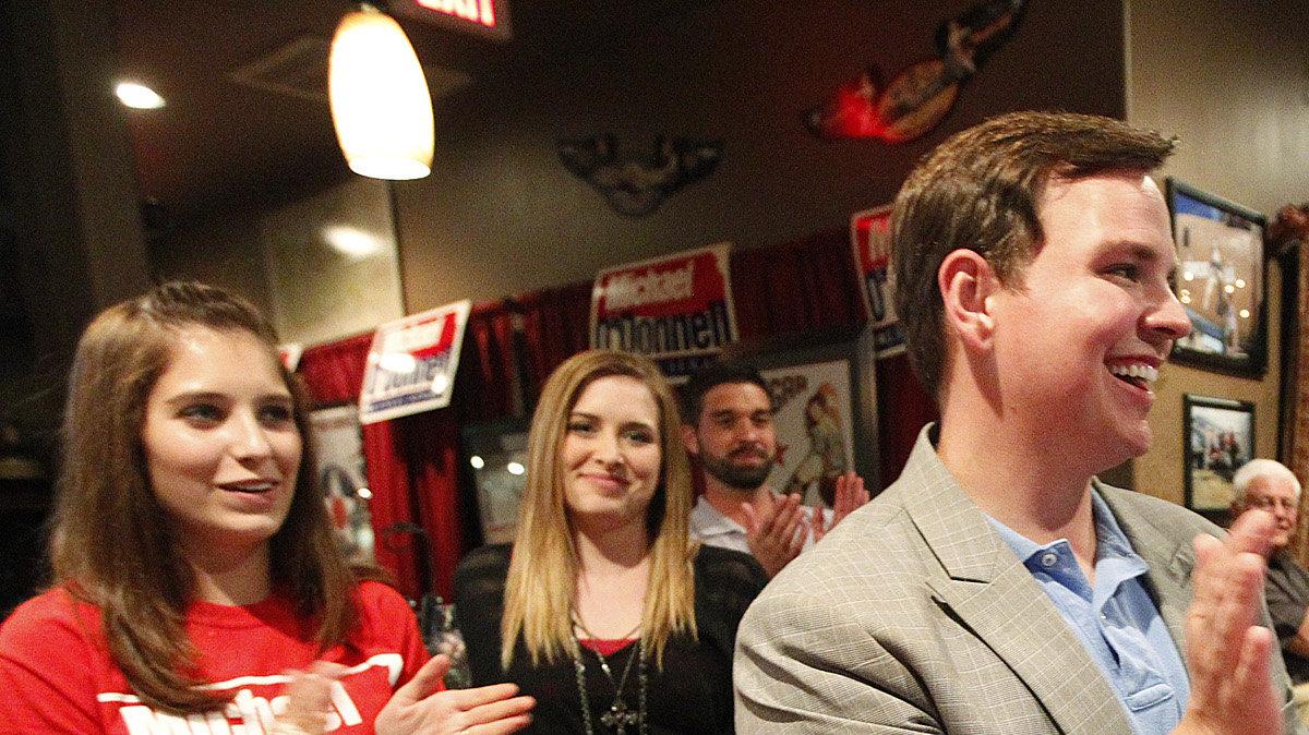 State senator candidate Michael O'Donnell celebrates his birthday, which was the day before, with supporters during his campaign party at Hanger One Steakhouse Tuesday. (Aug. 7, 2012)