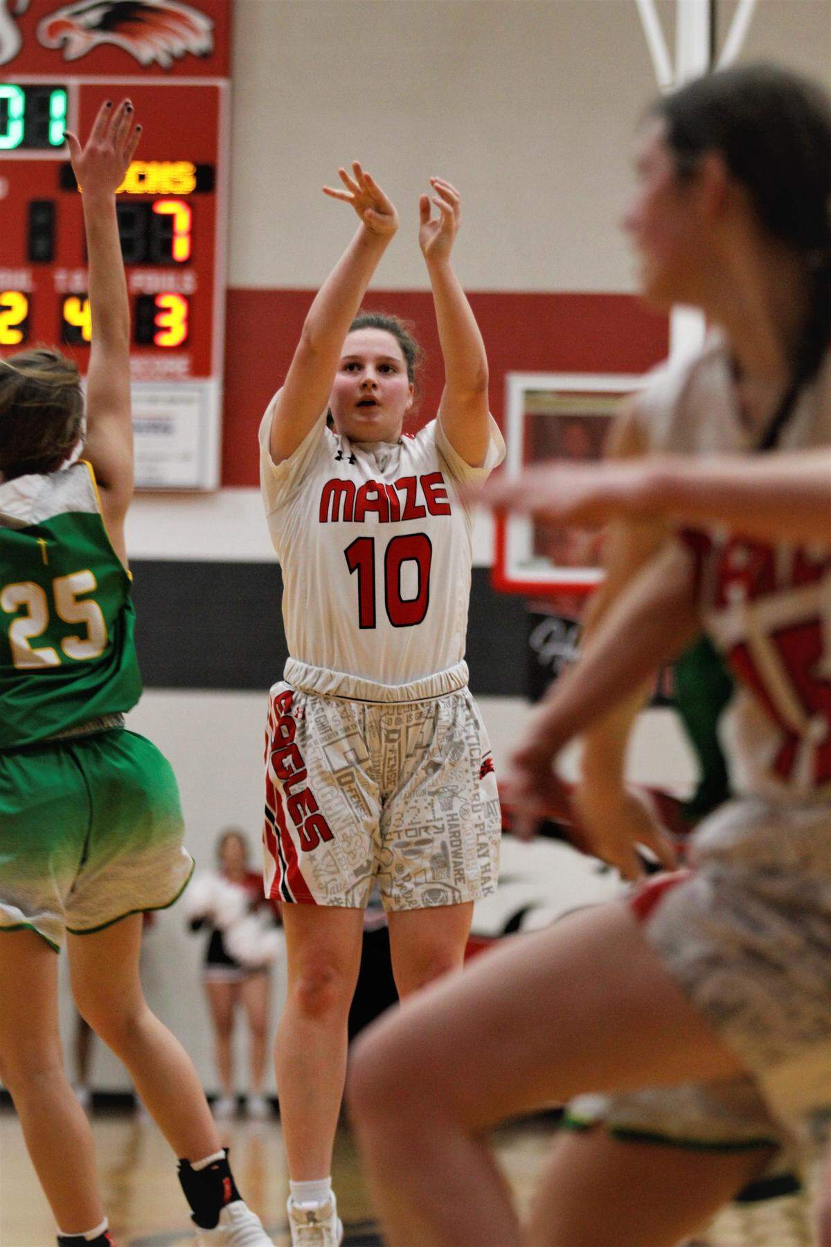 Maize sophomore Sydney Holmes launches a three during the Eagles’ 55-44 win over Bishop Carroll on Friday as part of the AVCTL/GWAL Challenge. (Jan. 11, 2019)