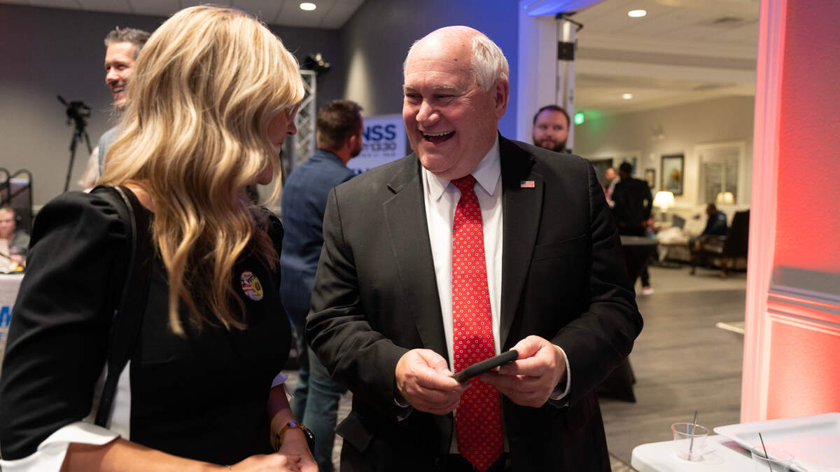 Rep. Ron Estes shares a laugh with Stephanie Wise at the Cozine Life Center. Estes will keep his U.S. congressional seat. Wise is leading her opponent in the Sedgwick County Commission District 3 race.