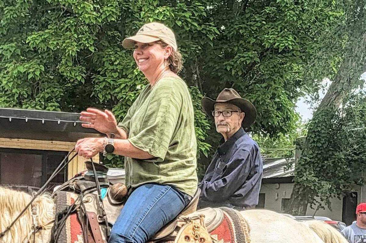 Farrell Hoy Jenab and her father, Jim Hoy, pictured in the Strong City Parade in June 2024. Josh Hoy and his daughter, Josie Hoy, also rode in the parade, which was something the family had done in the past. Jim and Josh died within a day of each other in February.