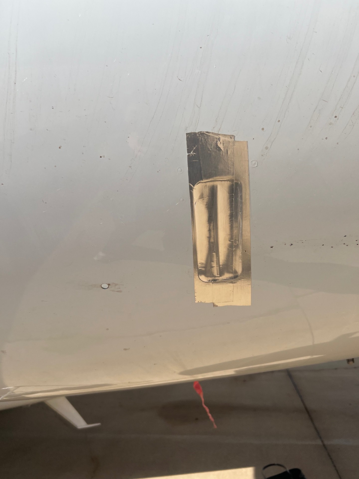 Attorney Russ Hazlewood said in October, his client learned the drain holes on its plane — which he said are supposed to always remain open — had been made water tight with aluminum tape (as shown in this photo). “There’s no excuse,” he said. “The manual is very clear that those at all times must remain free of blockage.”