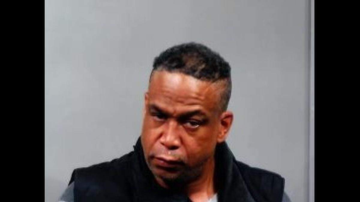 Darren Lee Hutcherson, 53, was arrested on suspicion of stabbing a Wichita police officer in the chest with a butter knife and booked into jail on suspicion of first-degree murder. The officer was uninjured.