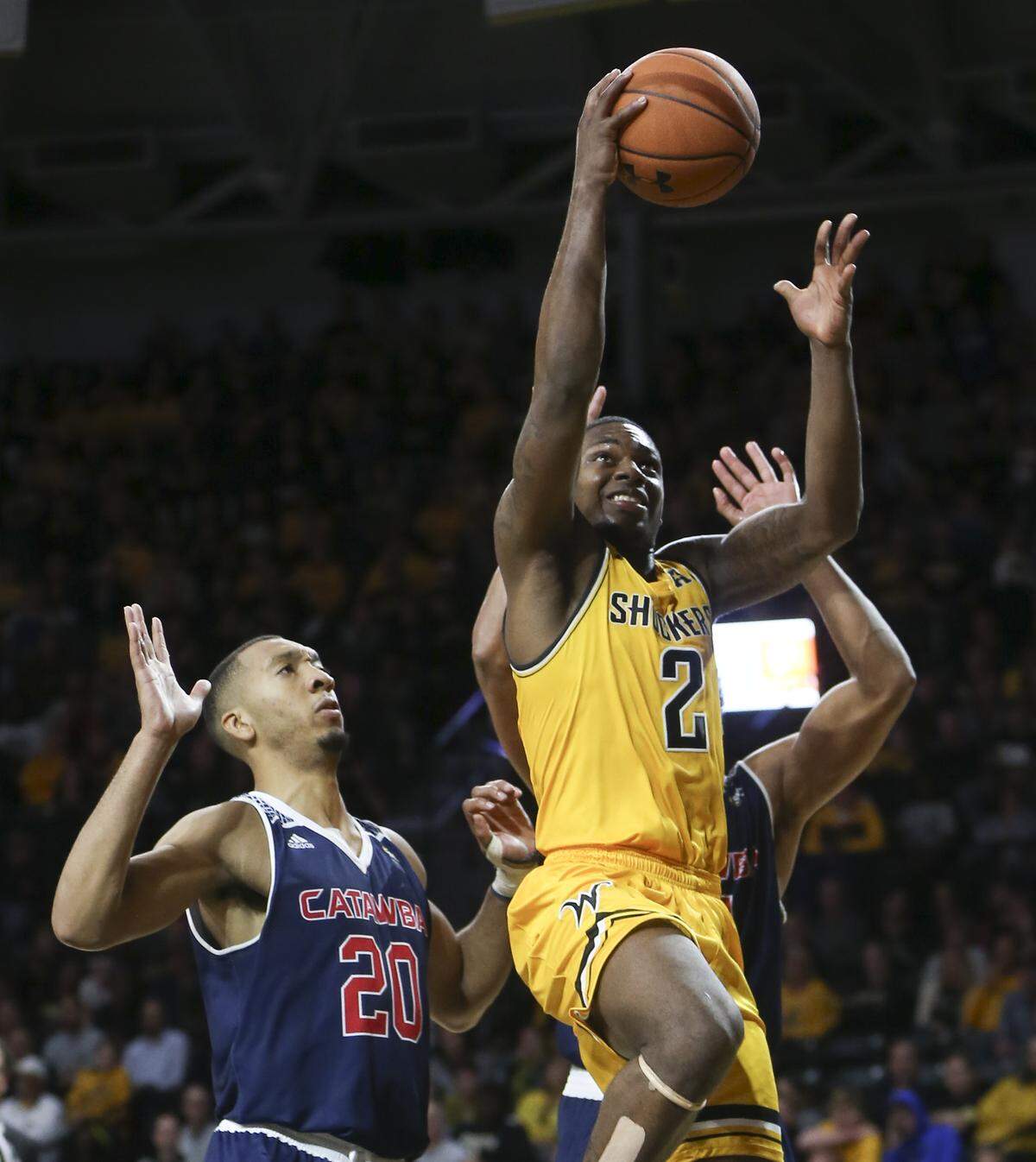 Wichita State’s Jamarius Burton drives to the basket against Catawba’s Jeremy McLaughlin during the second half of their exhibition game at Koch Arena on Tuesday.