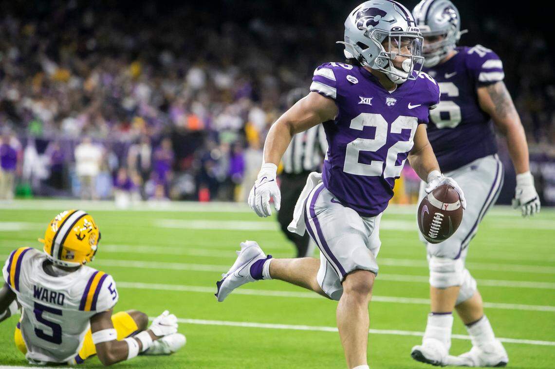 Kansas State running back Deuce Vaughn (22) jogs into the end zone for a touchdown during the TaxAct Texas Bowl game between the Kansas State Wildcats and the LSU Tigers on Tuesday January 4th, 2022 at NRG Stadium in Houston, Texas.