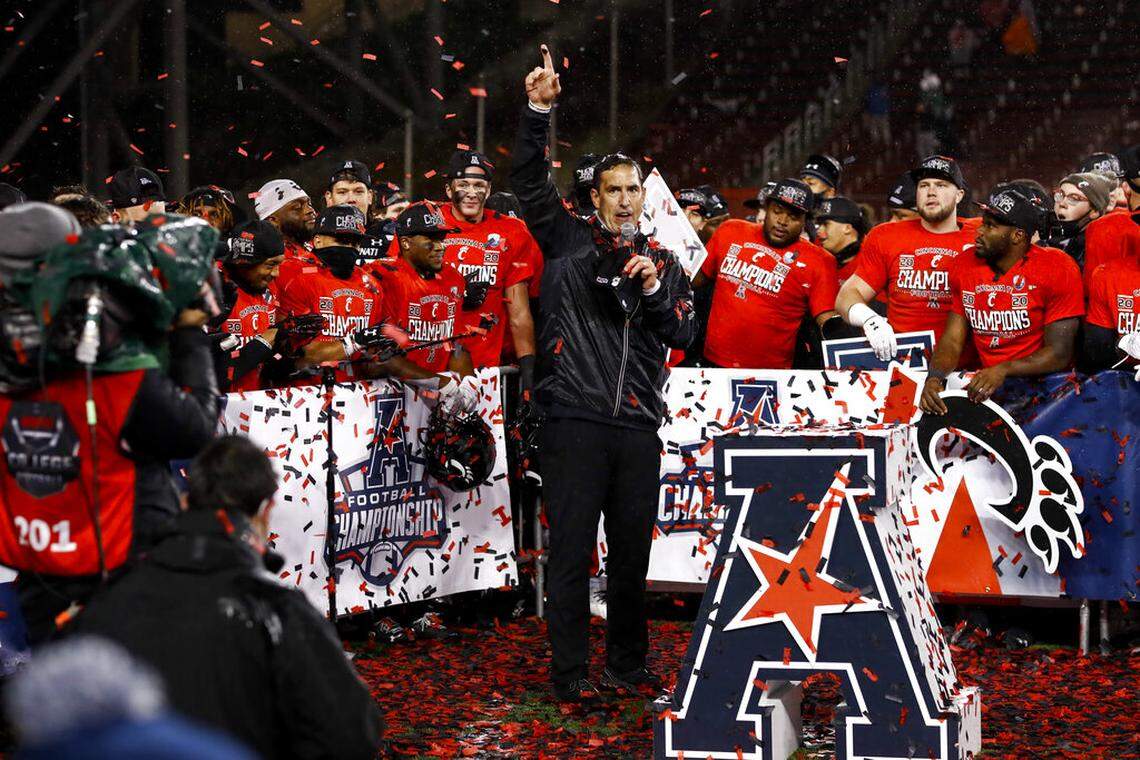 Cincinnati head coach Luke Fickell speaks to fans following the American Athletic Conference championship NCAA college football game against Tulsa, Saturday, Dec. 19, 2020, in Cincinnati. Cincinnati won 27-24. (AP Photo/Aaron Doster)