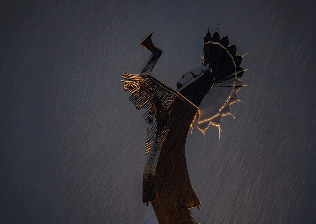 The Keeper of the Plains during a heavy snowfall in Wichita on Thursday night.