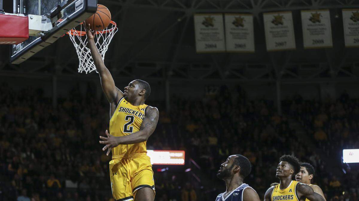 Wichita State’s Jamarius Burton takes a shot against Catawba during the first half of their exhibition game at Koch Arena on Tuesday. 
