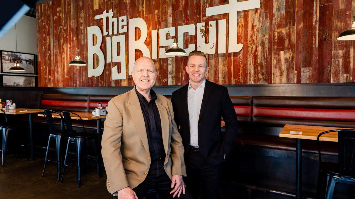 Father and son David Offerdahl, left, and Chad Offerdahl, right, bought The Big Biscuit concept from its Kansas City-based founder in 2010. The chain now has 28 restaurants and will expand into Wichita next year.