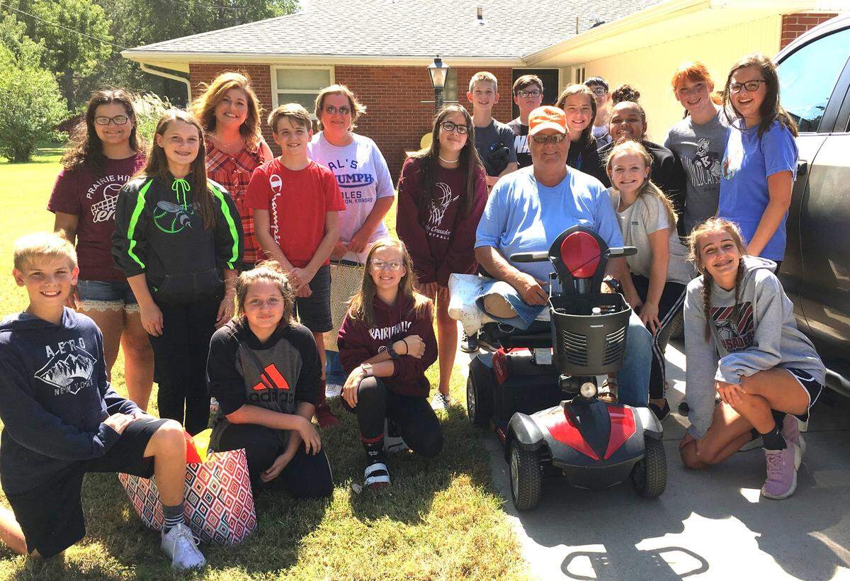 Buhler students brought Dennis Pierson food they cooked. Pierson, who was known for smiling and waving at drivers outside of his home, passed away on Tuesday.