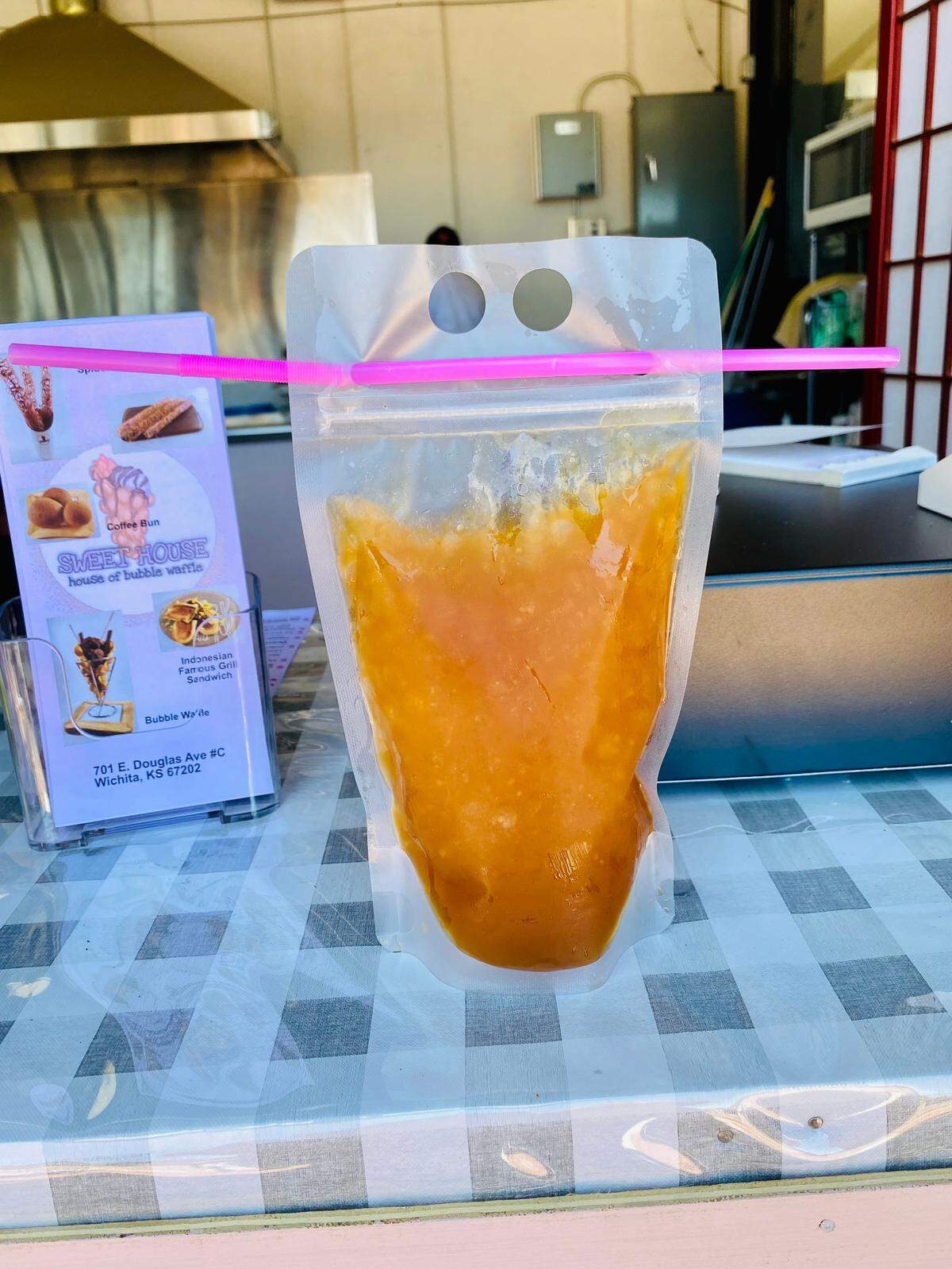 The flavored tea is served in a fun, see-through pouch at Sweet House.