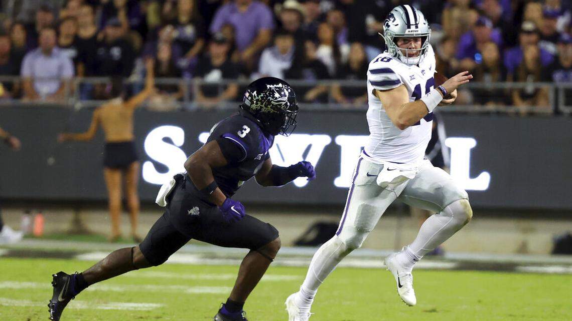 TCU safety Mark Perry (3) pursues Kansas State quarterback Will Howard (18) during the first half of an NCAA college football game Saturday, Oct. 22, 2022, in Fort Worth, Texas. (AP Photo/Richard W. Rodriguez)