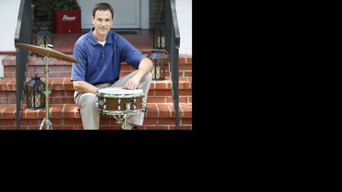 TJ White volunteers his time as musical director of Skylines, a youth band. White has been a musician for about 30 years. (June 25, 2014) 


