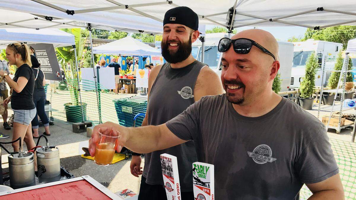 Aero Plains Brewing owner Lance Minor, right, will be one of the brewers distributing samples at Saturday’s