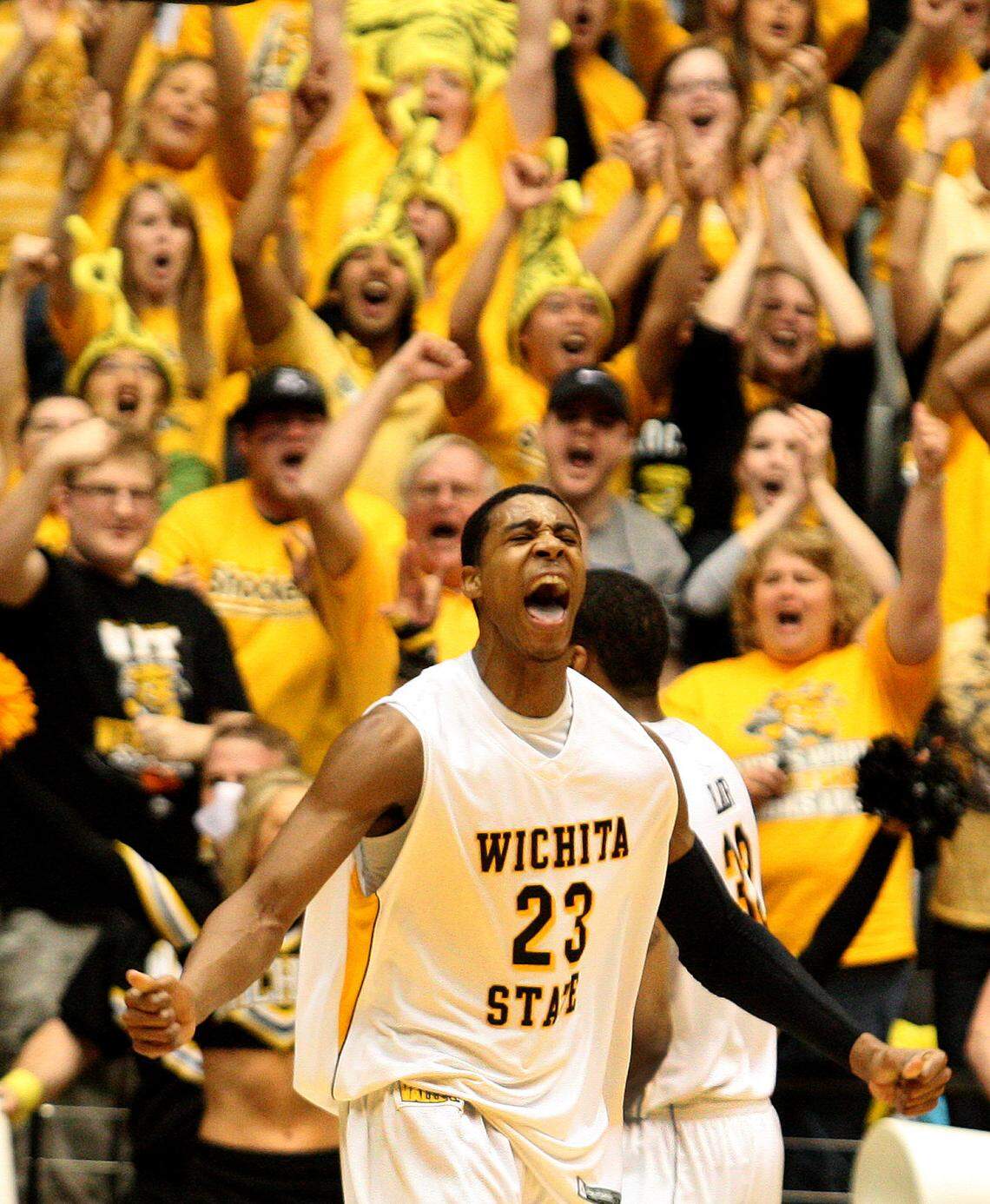 Wichita State’s Toure Murry celebrates as the Shockers start to pull away from The College of Chaleston in the 2nd half of their NIT quarterfinal game at Koch Arena in Wichita, Kansas Wednesday. WSU won 82-75.(March 23, 2011)