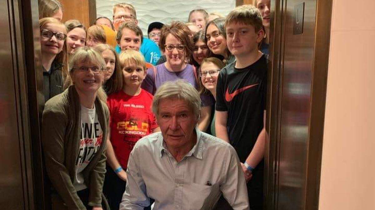 Harrison Ford posed with a group of kids during his 2019 visit to Wichita.