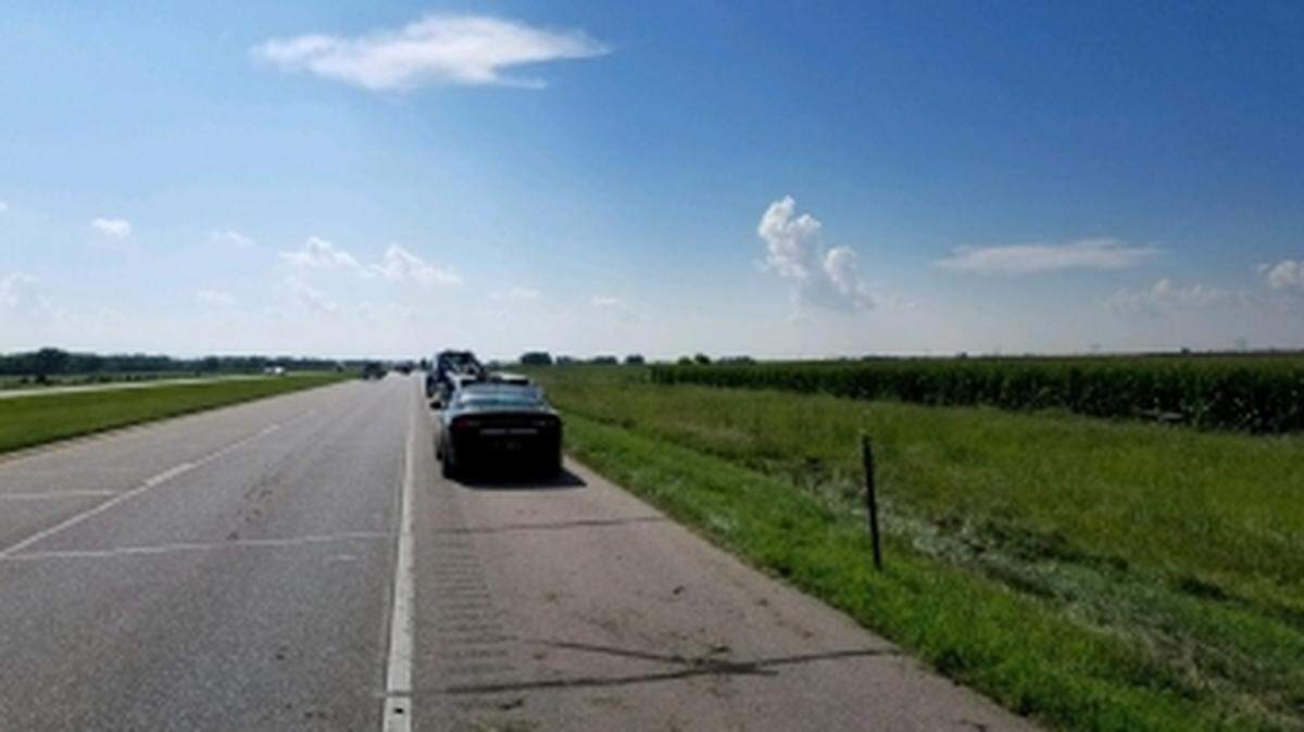 Troopers said a woman stole an unmarked Nebraska State Patrol car after an investigator came to help.