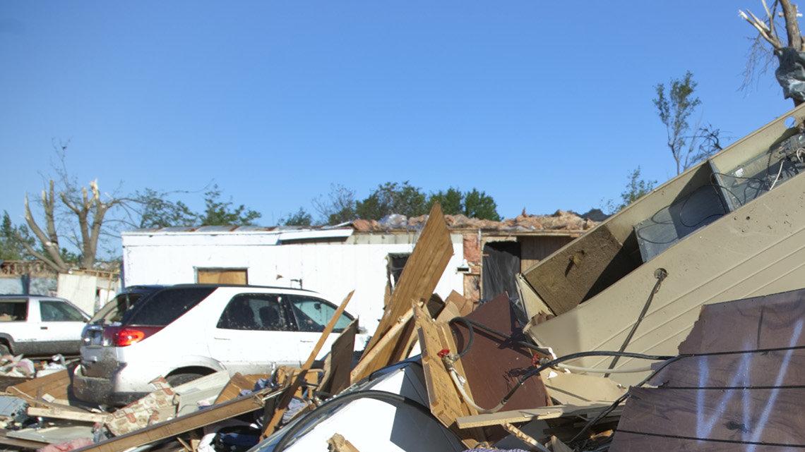 Residents, friends and family members begin the salvage and cleanup work in Pinaire Mobile Home Park Monday, Apr. 16, 2012, after a tornado swept through the Oaklawn neighborhood in southeast Wichita overnight Saturday, Apr. 14, 2012.