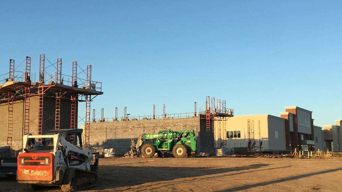 Anytime there’s construction, especially at the Greenwich Place shopping center at K-96 and Greenwich, people always wonder what’s coming next. This is a picture of REI when it was in the works there several years ago. Now, there soon will be construction by REI for a new T-Mobile store.