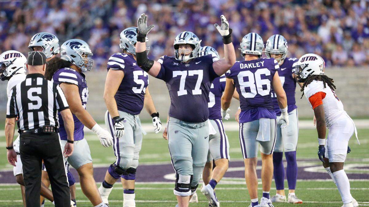 Kansas State Wildcats offensive lineman Carver Willis (77) celebrates a field goal during the third quarter against the Tennessee-Martin Skyhawks at Bill Snyder Family Football Stadium.