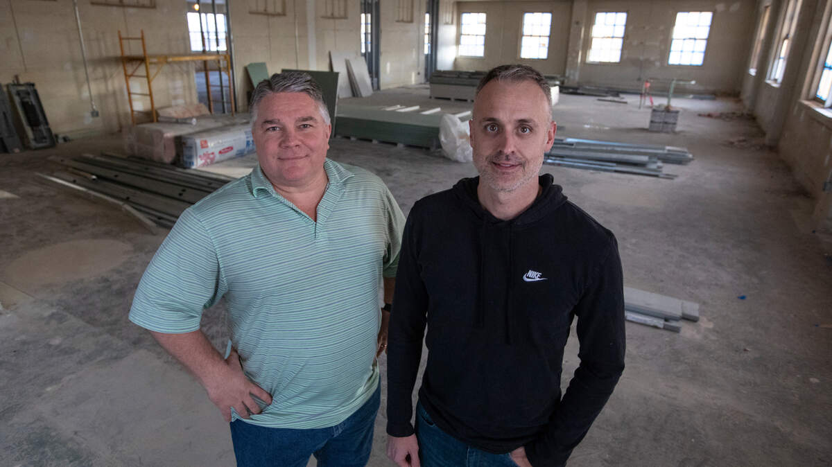 Jaco General Contractor CEO Joshua Kippenberger, right, and president John Walker stand on the second floor of the FireWorx building on South Topeka. The company has been helping transform the former fire station and now has plans to move there as well.