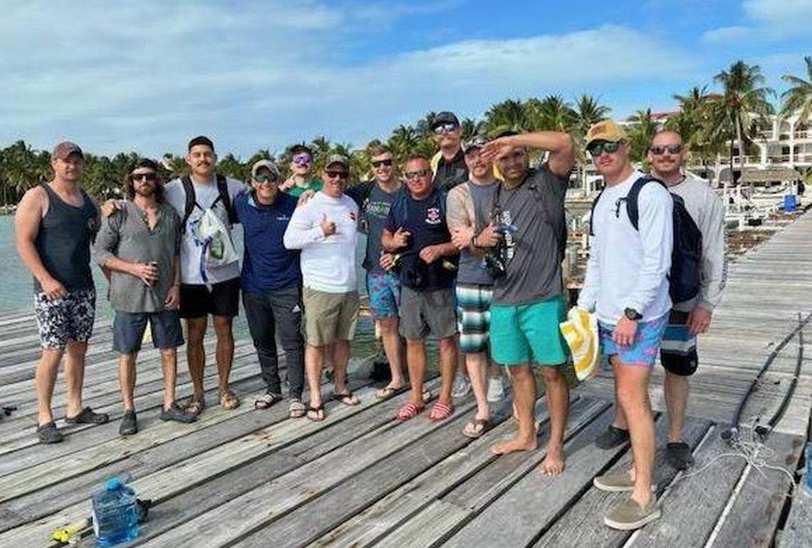 A group of mostly Wichita firefighters went on a trip to Belize in February. Included in the photo is Ty Voth, who died Thursday while fighting a house fire.