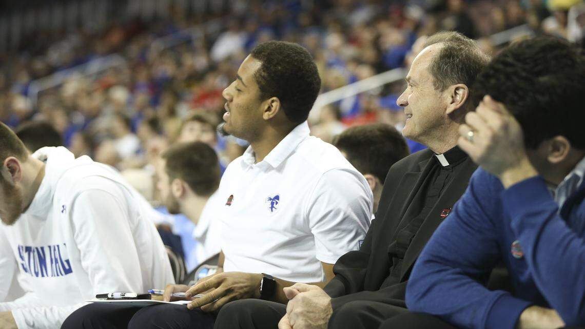 KU's next NCAA opponent will have a priest on its bench. Meet Father John.