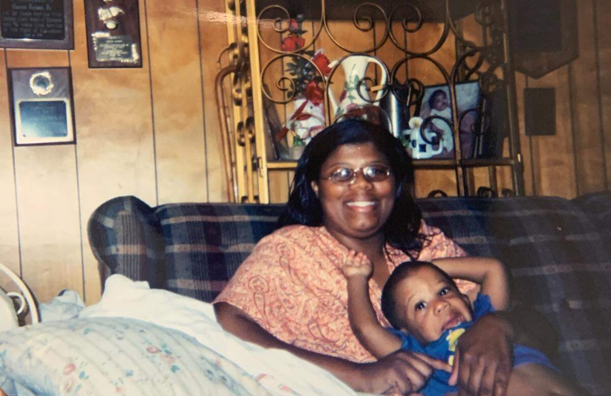 Juanita Durham and her son, Clarence Jackson, when he was a young boy in their Dublin, Ga. home.