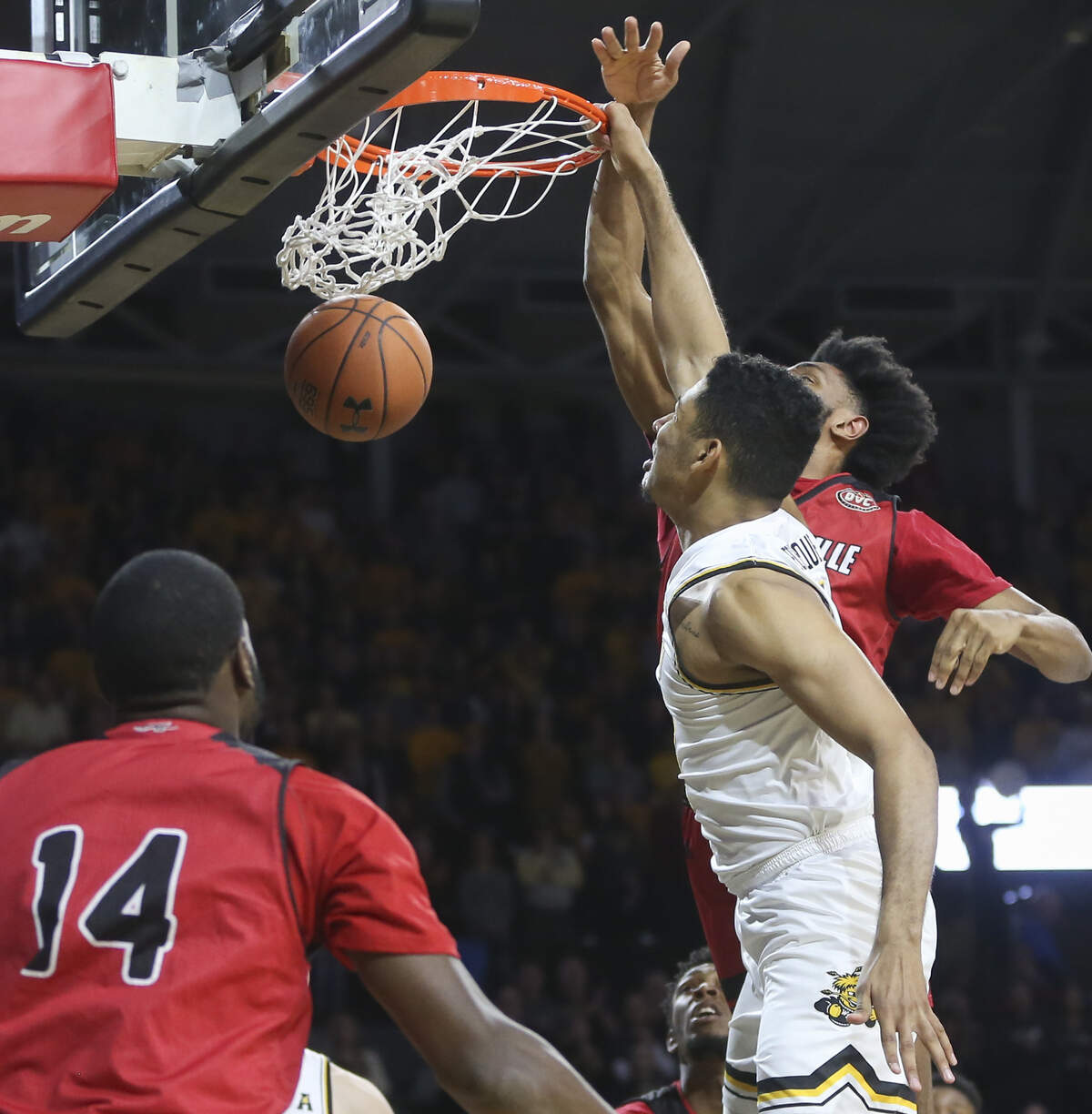 Wichita State forward Jaime Echenique dunks against Jacksonville State forward Christian Cunningham during the first half of their game at Koch Arena on Wednesday.