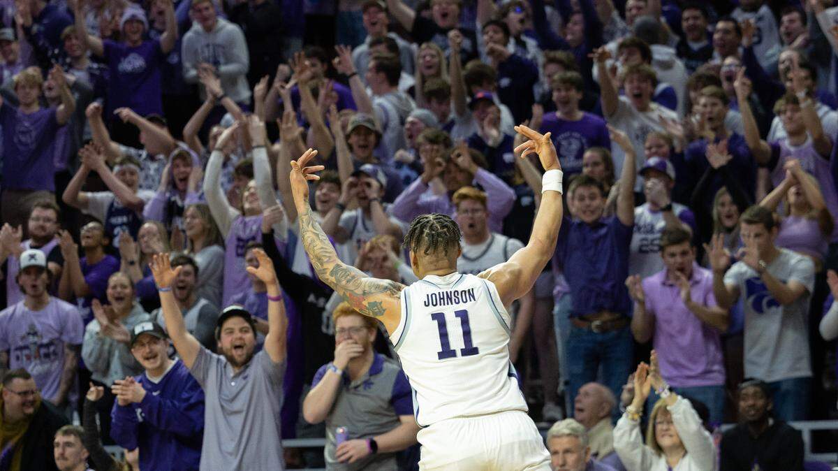 Kansas State’s Keyontae Johnson celebrates with the student section after hitting a three pointer against Oklahoma during the first half on March 1, 2023, in Manhattan.