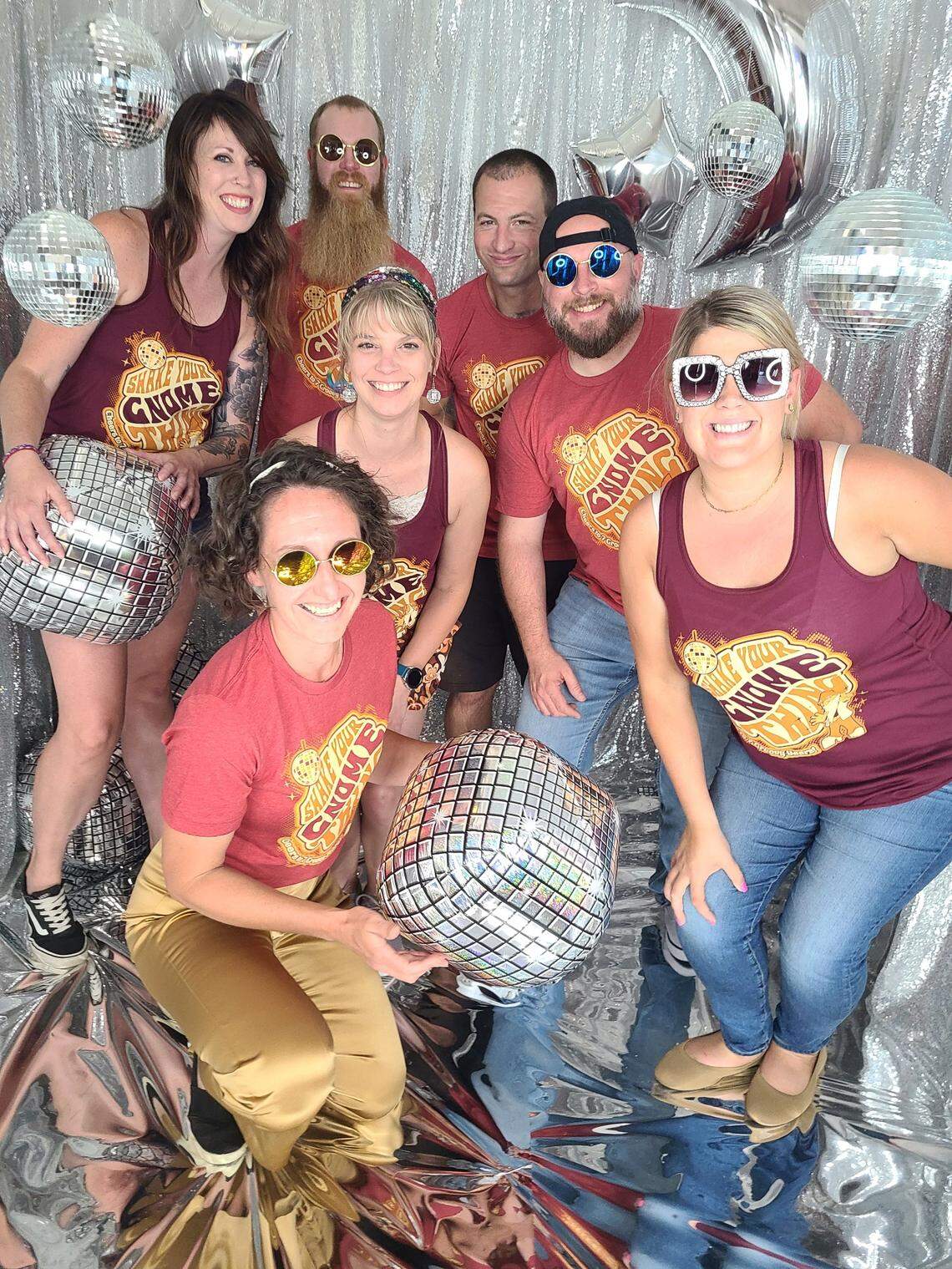 Hopping Gnome Brewing founders Torrey and Stacy Lattin, second and third from top left, announced a big expansion at their business’ birthday party on Saturday.