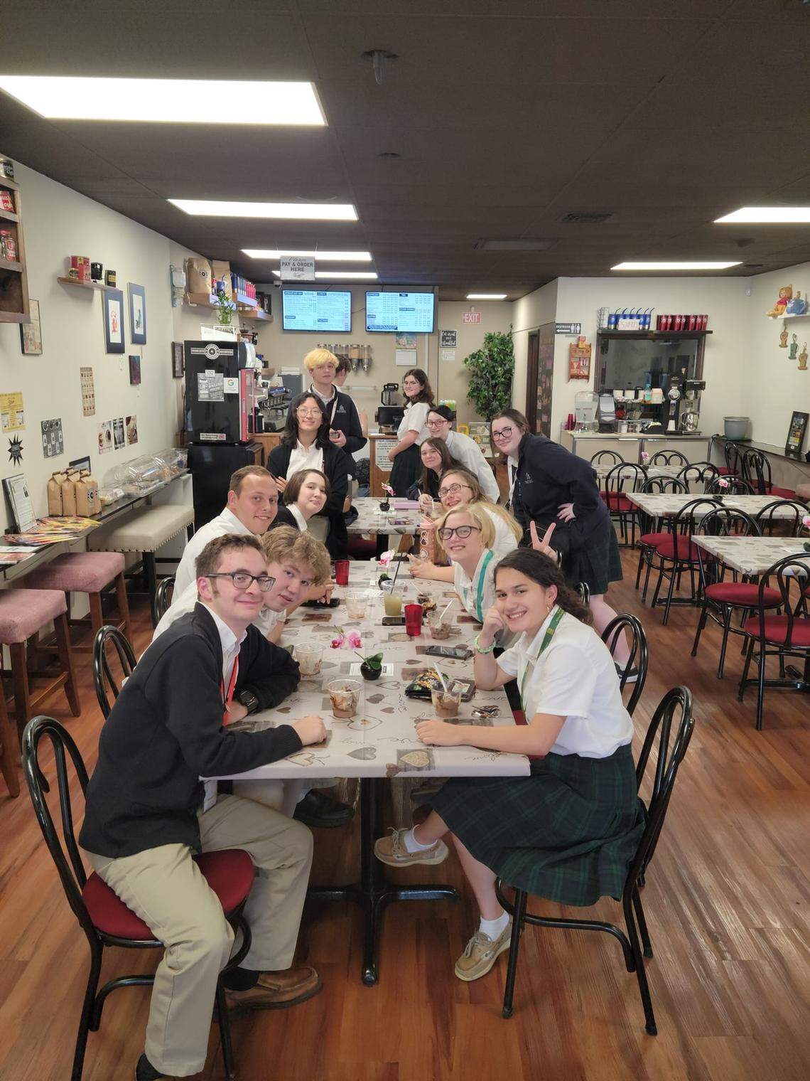 Carpe Diem Cafe was popular with students from nearby Bishop Carroll High School, its owner said.