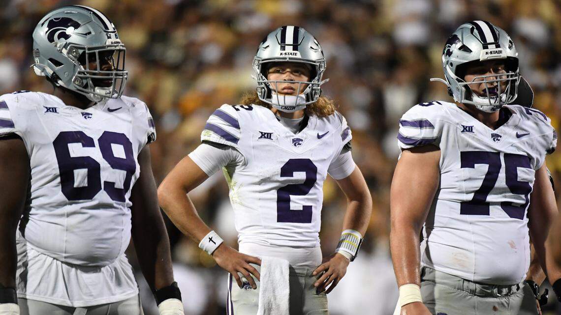 Kansas State Wildcats quarterback Avery Johnson (2) waits during a timeout during the first half against the Colorado Buffaloes at Folsom Field.