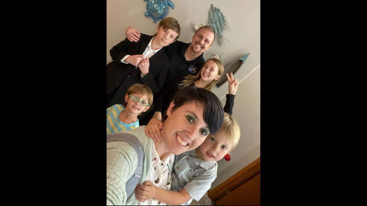 Ashlea and Andy Pfannenstiel are pictured with their four children, including 4-year-old Eddie, bottom right. The couple is about to reopen Carpe Diem Cafe in Wichita as Eddie’s Cafe, and they’ll continue the original owner’s mission of offering jobs to members of the special needs community.