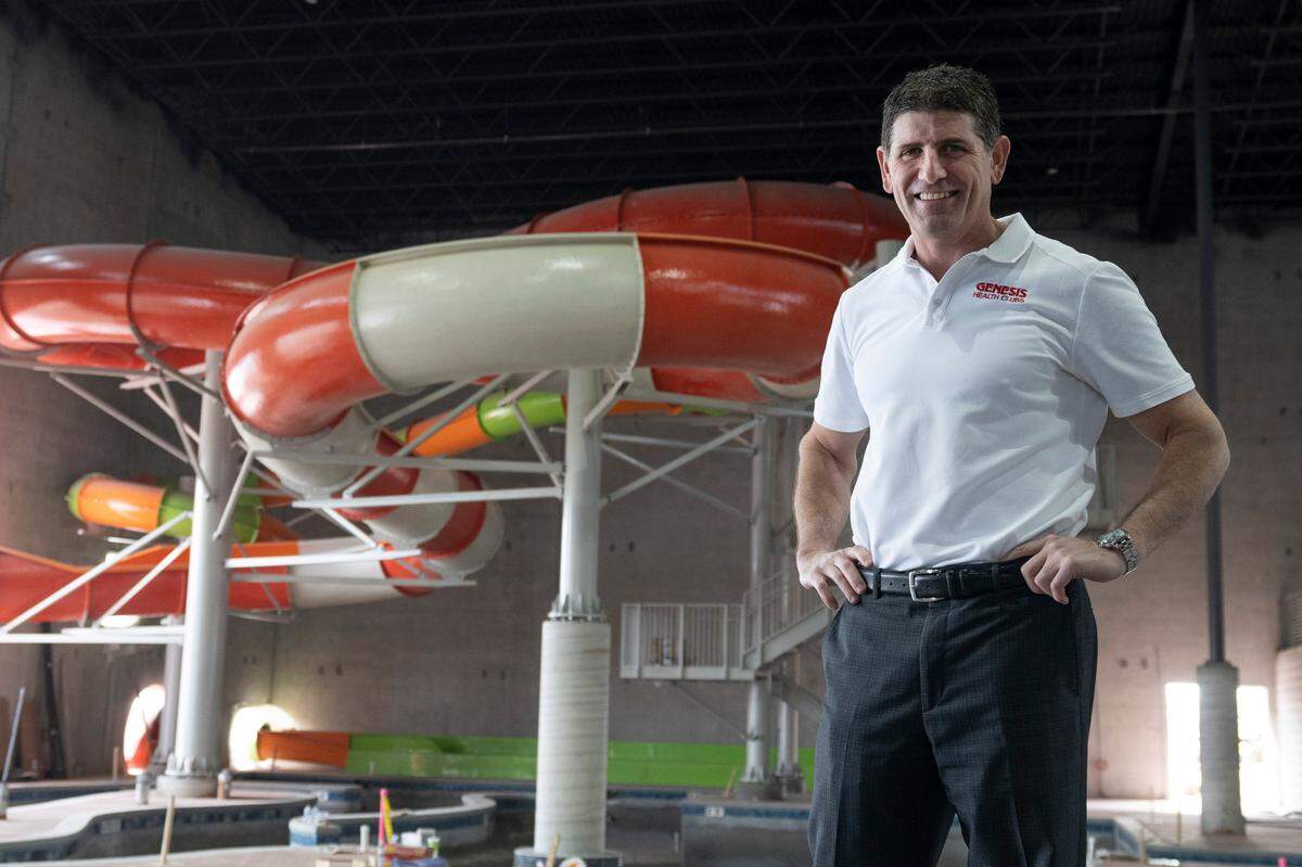Rodney Steven II stands inside the Blast Off Bay water park at the Genesis Sports Complex in Goddard. In addition to the water park, which includes a swim-up bar and an indoor surf machine, there will be a new Genesis Health Club, a 600-seat competitive natatorium and five new softball fields to go with the existing five baseball fields. The complex also includes a 133-room Hampton Inn and a licensed preschool.