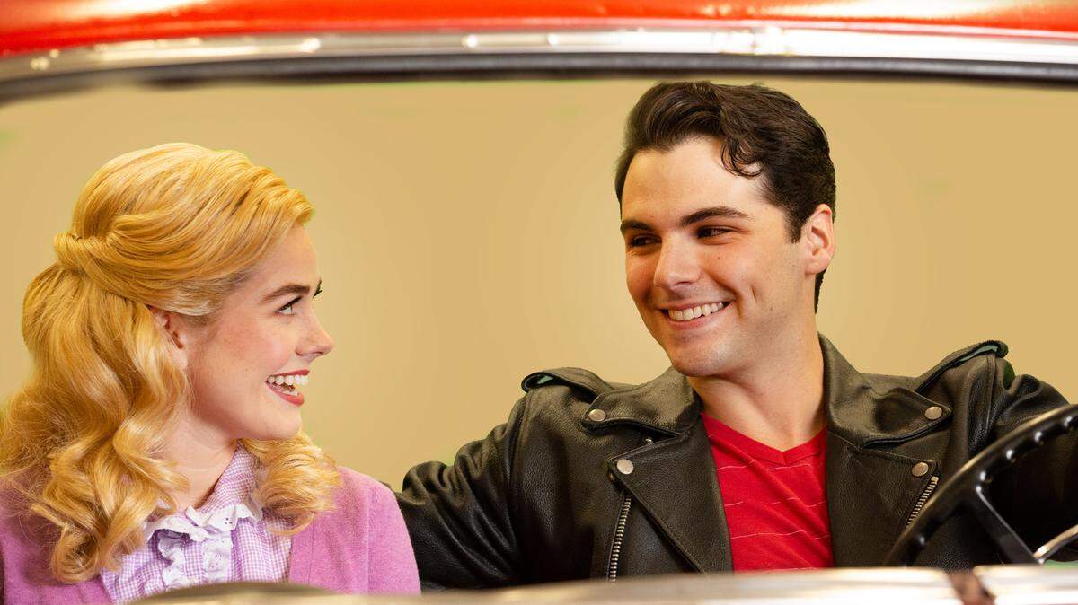 Sandy (Zan Berube) and Danny (Jake David Smith) renew their summer romance at the Twi-Light Drive-in near Rydell High in Music Theatre Wichita presentation of “Grease.” The show runs Sept. 15-19 at the Capitol Federal Amphitheater in Andover.