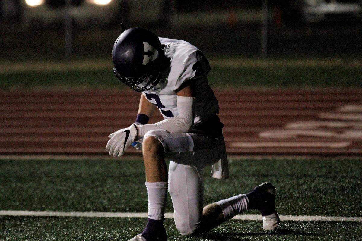 Valley Center’s Blayne Hightower takes a moment after dropping a touchdown pass in the Hornets’ 27-17 loss to Andover Central on Thursday. (Sept. 20, 2018)