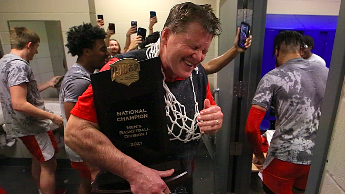 Coffeyville Community College men’s basketball coach Jay Herkelman celebrates the program’s first national championship since 1962 after his team’s 108-99 win over Cowley in Saturday’s title game in Hutchinson.