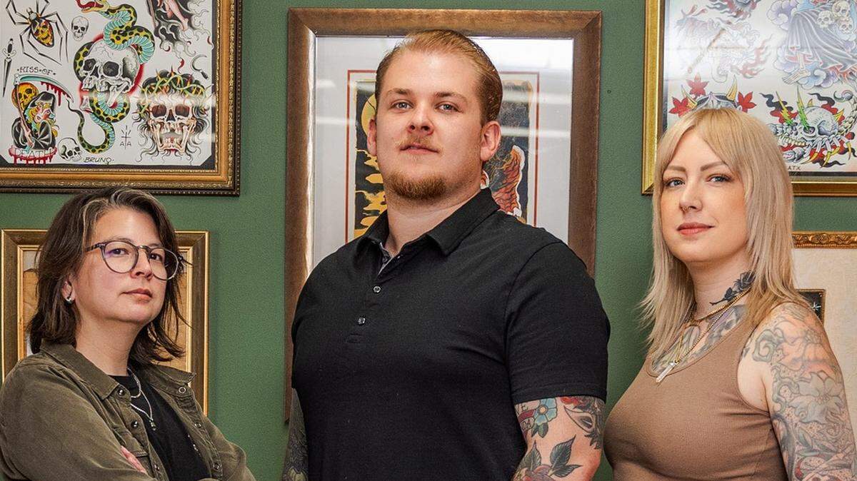 Former Hell Bomb Tattoo employees Megan Shelton, left, Tyler Warren, center, and Shaila Roach, right, have opened Tenfold Tattoo not far from Hell Bomb.
