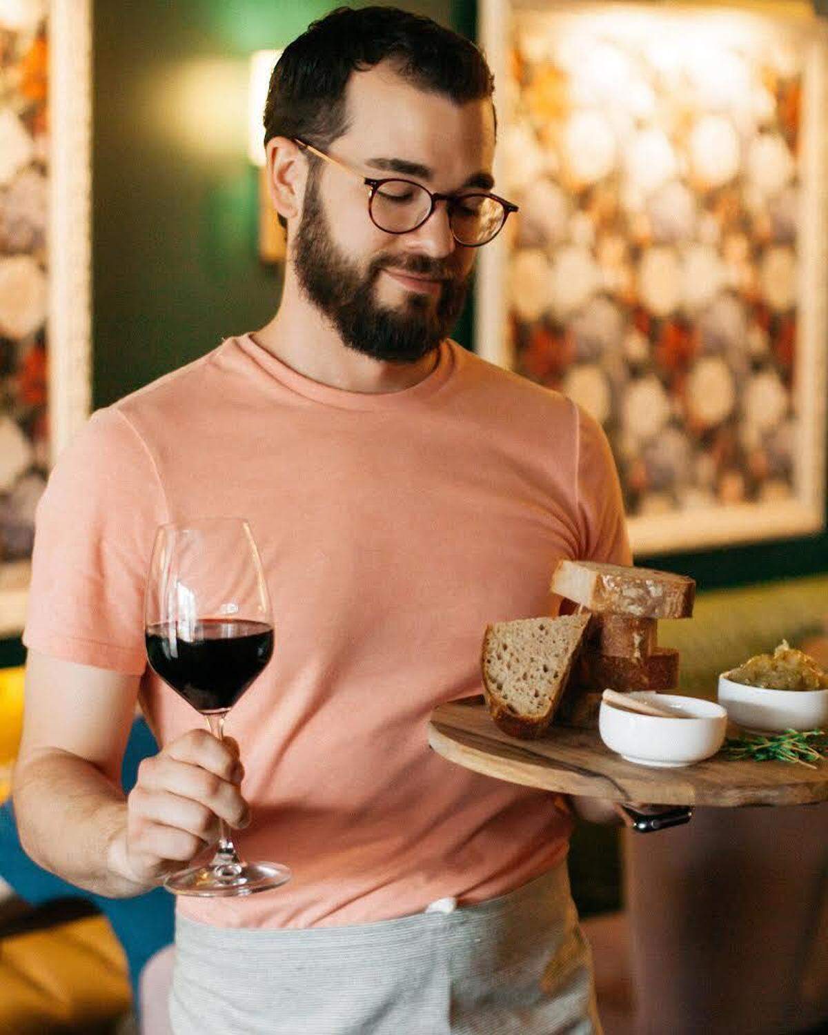 Austin Dugan, founder of 86 Cold Press, is one of the partners in the new Fleur de Vin, a wine bar opening on Saturday in Wichita.