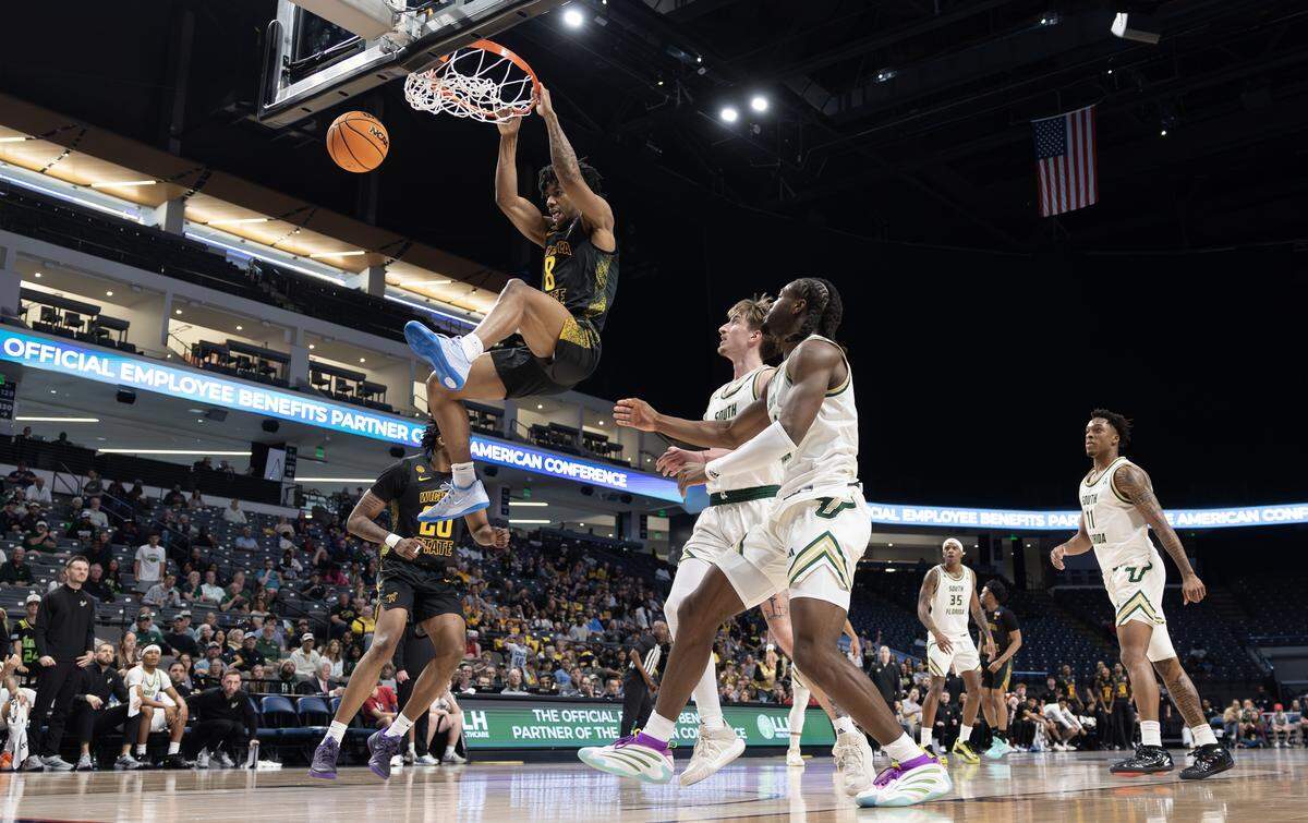Wichita State’s Dillon Battie dunks the ball during the first half of their AAC tournament championship game against South Florida on Sunday in Birmingham.