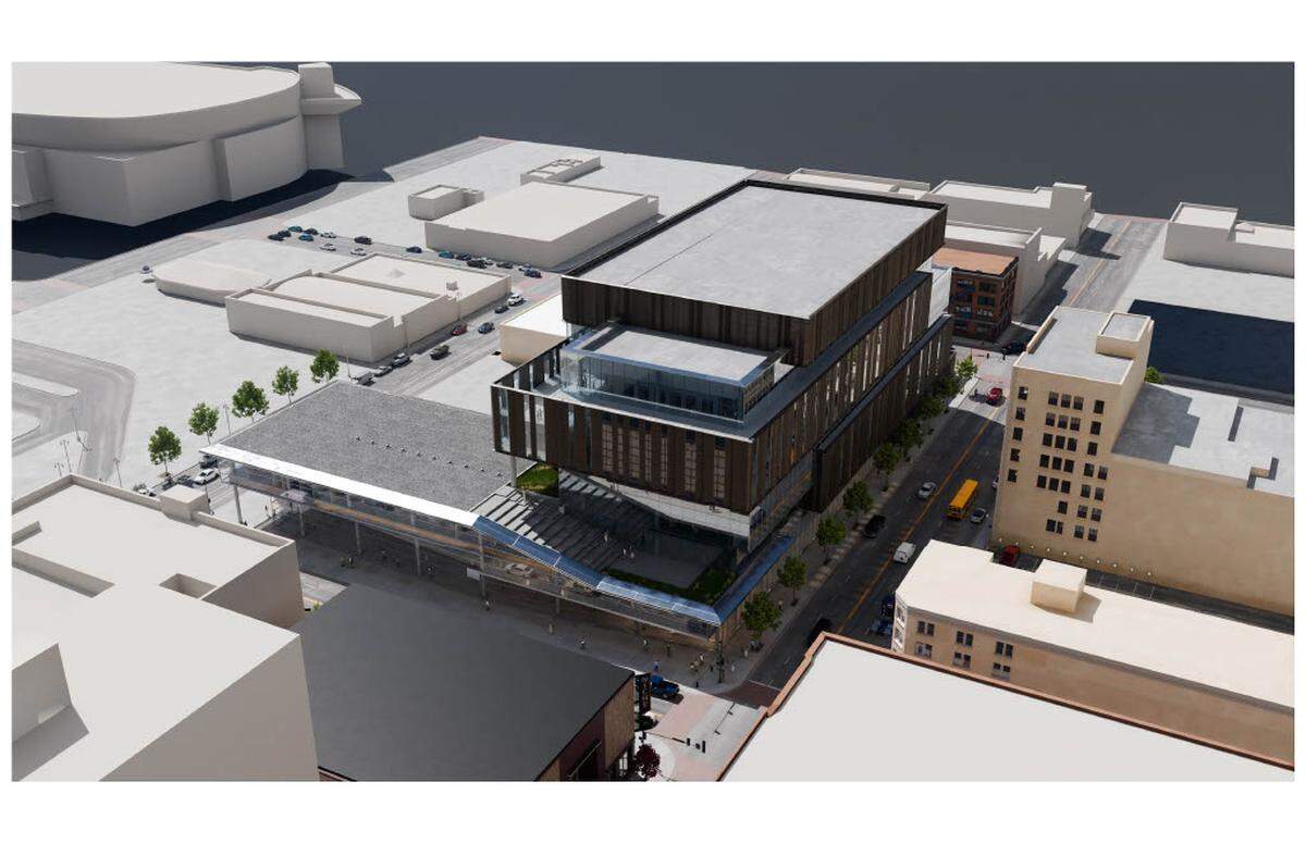 The main entry to the first phase of the Wichita Biomedical Campus is off of Topeka, one block east of Broadway, and it leads to a three-story section of the building that the architects refer to as a pavilion. “That element, it is special,” architect Jonathan Kanda said of the mostly glass structure. “There’s a kind of, dare I say, jewellike quality to it.” The pavilion, with a flat roof, is shown on the left of this illustration.